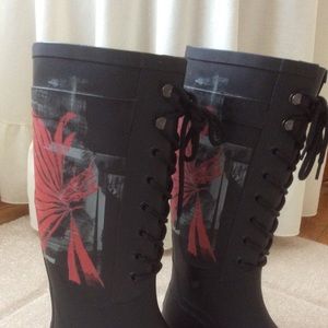 Diesel Burning Hot high laced rubber boots.